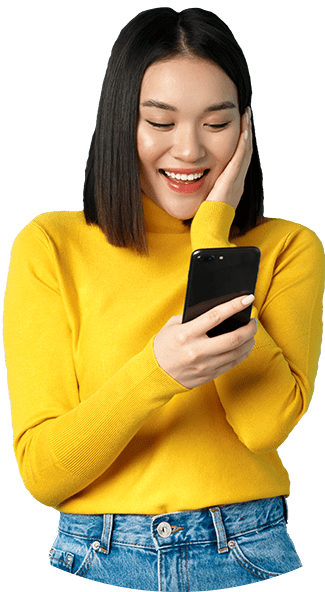 Almeydadesigner 8 almeydadesigner image of happy asian woman reading message on mobi FKGGSJ9 e1650561666821 almeydadesigner