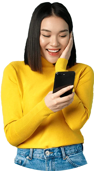 image of happy asian woman reading message on mobi FKGGSJ9 e1650561666821 almeydadesigner